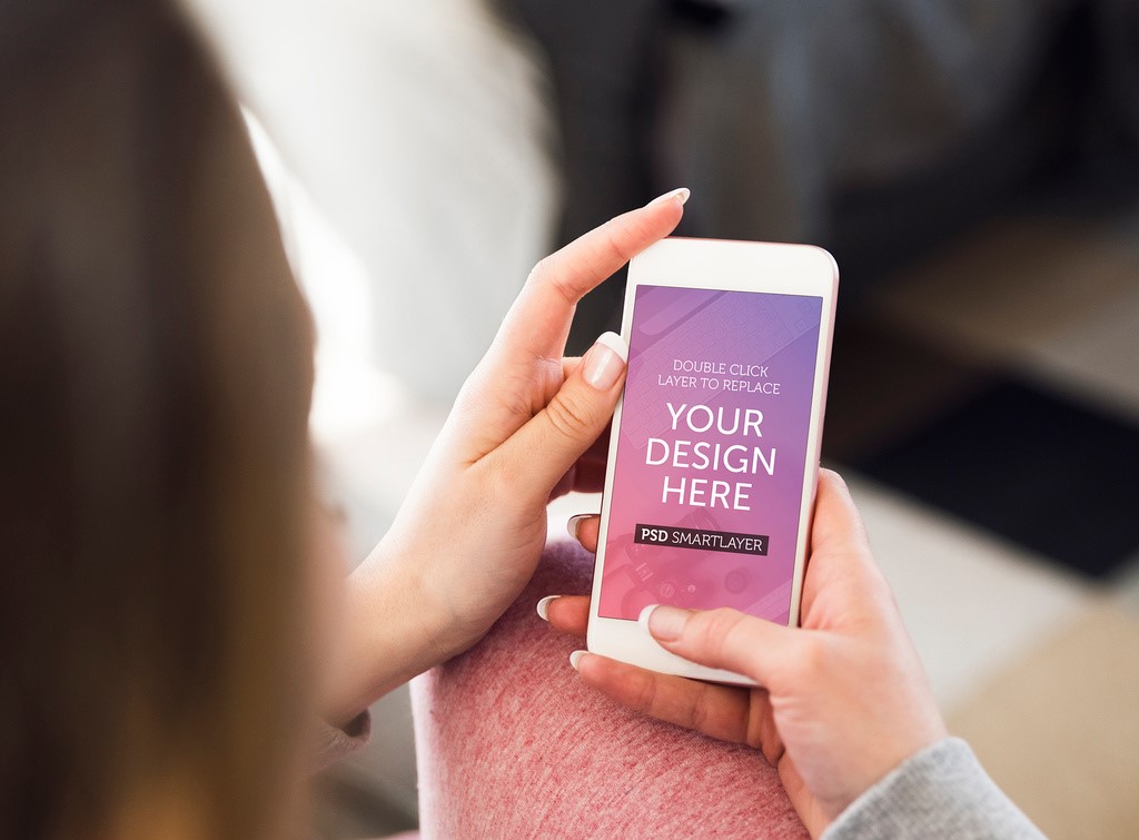hands-holding-smartphone-mockup-psd