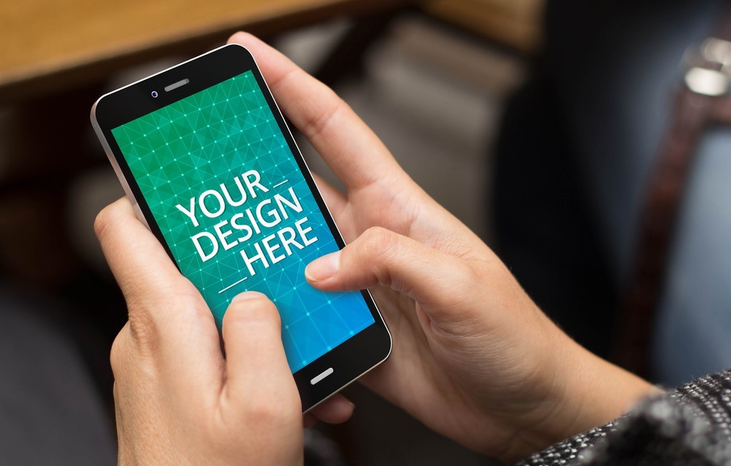 woman-using-smartphone-mockup-psd